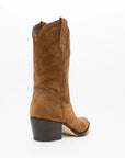 The ONCEPT Winslow Boot is a tan suede, western-inspired style featuring a mid-height stacked heel, rounded toe, and top pull tabs, shown angled slightly from the back on a white background.