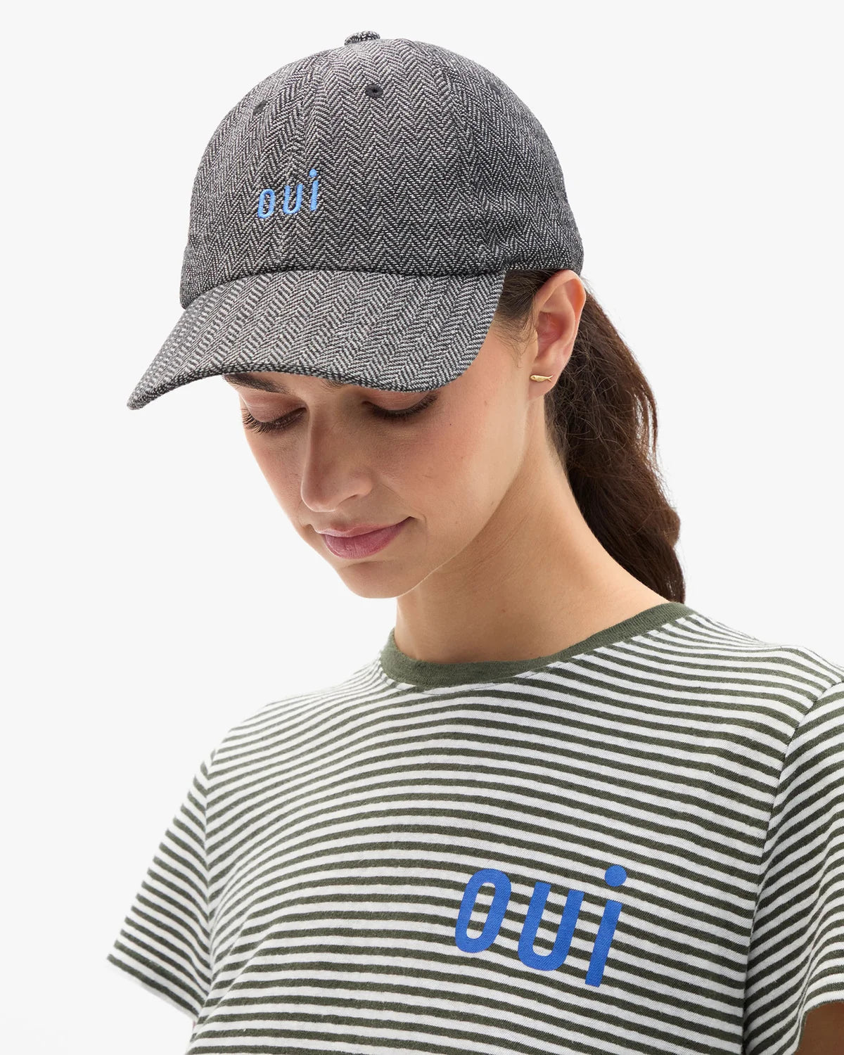 Clare Vivier wool baseball hat with oui text, cozy winter accessory in dark fabric at Bungalow Furniture & Accessories.