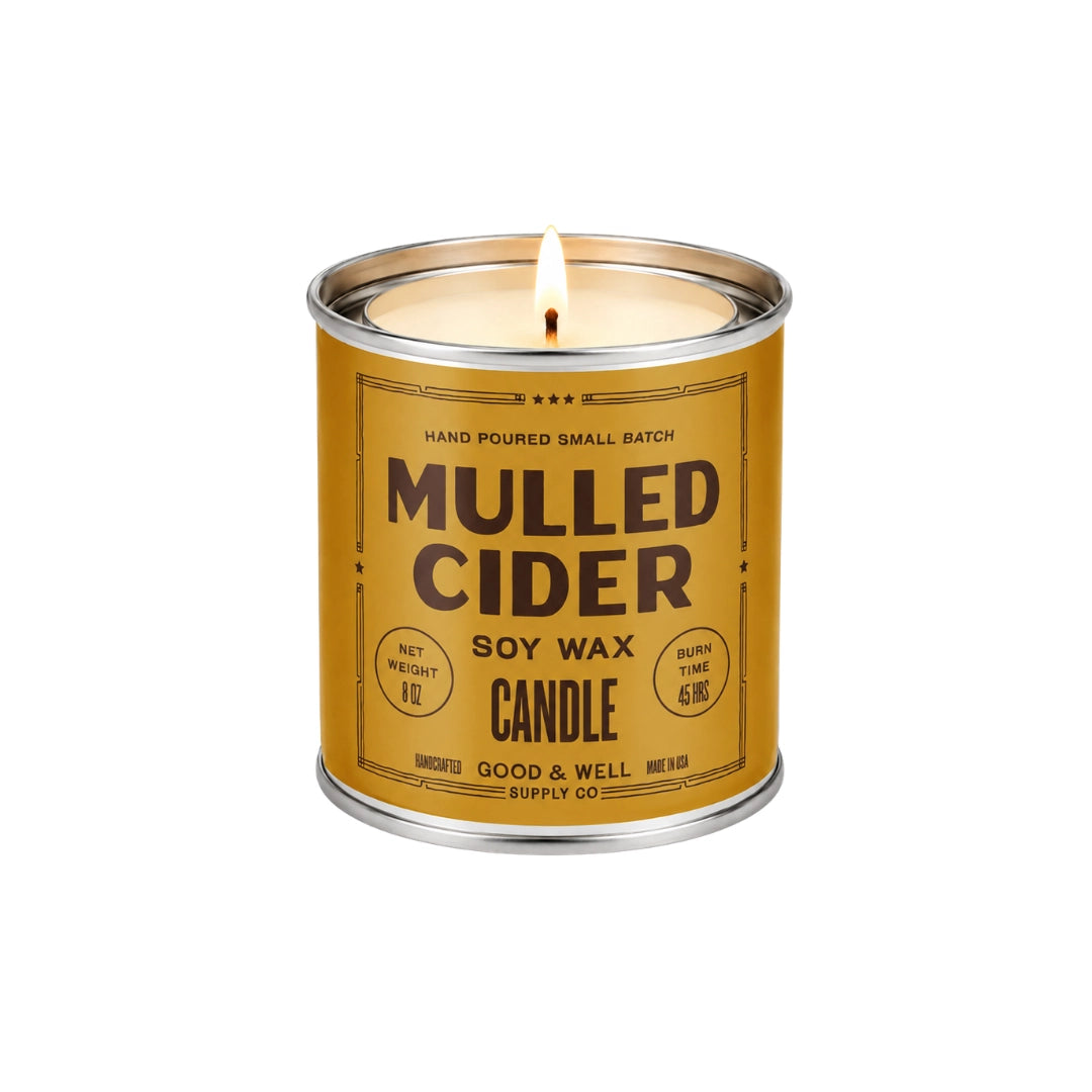 Tin of Faire Mulled Cider Soy Candle with labeled lid, spiced apple scent, from Bungalow Furniture & Accessories.