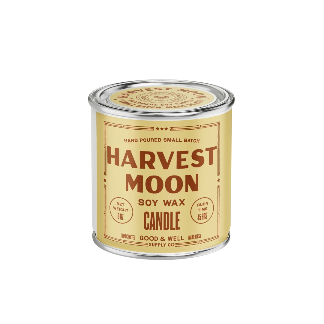 Yellow Harvest Moon Soy Candle tin by Faire with maple cinnamon vanilla scents.