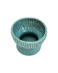 The Norlin Bowl by The Import Collection features blue ceramic with a textured, patterned rim and a wide, round base—perfect for decorative bowls or artistic tabletop displays. Shown against a white background.
