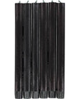 A set of Faire Jet Black Eco Dinner Candles S/2 stands upright against a white background, each slim candle featuring a visible wick at the top.