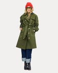 Kerri Rosenthal Color Washed Trench coat styled with red beanie and boots, casual outdoor look.