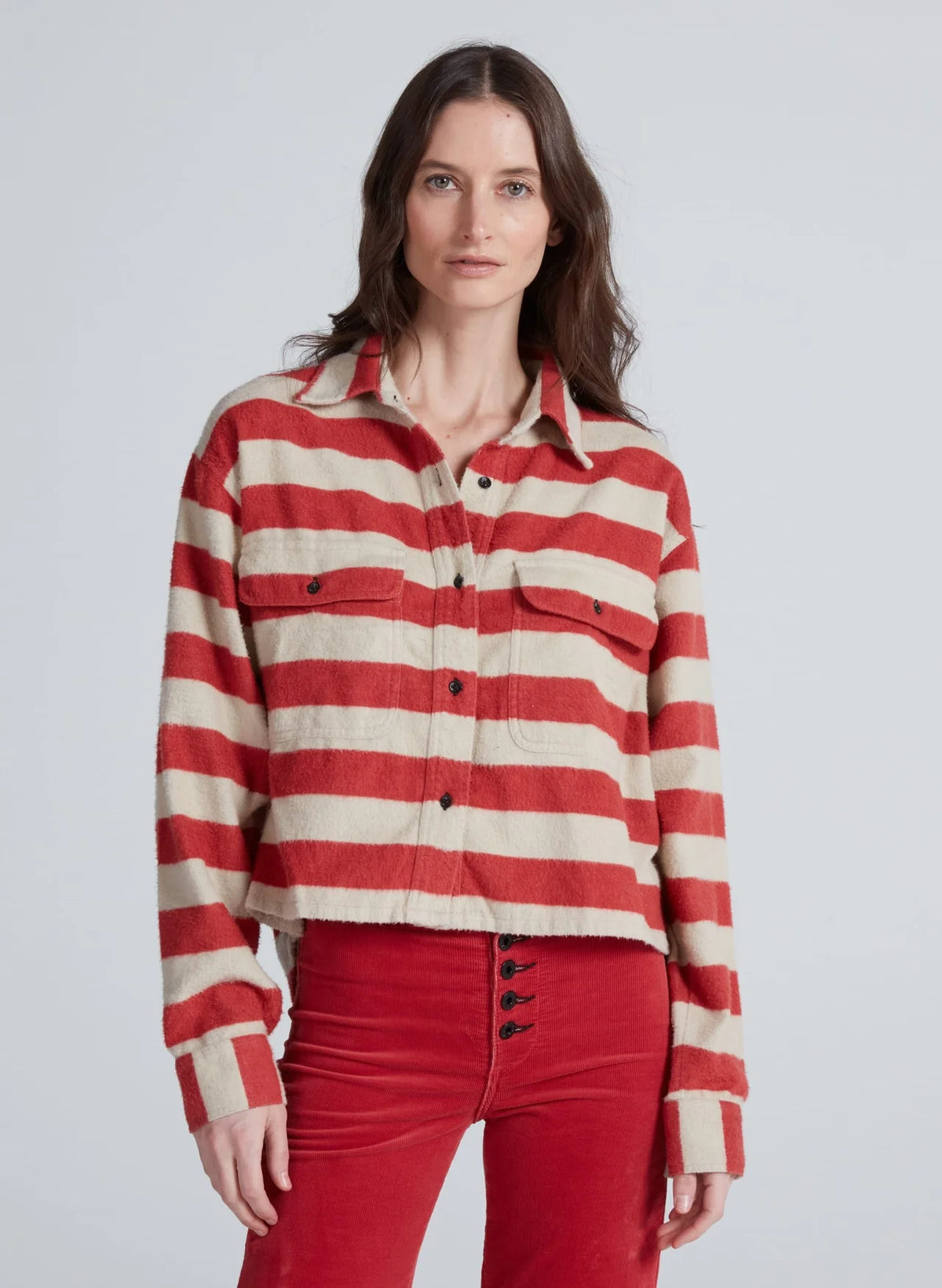 Relaxed cropped button-down shirt by ASKK in red with wide horizontal stripes and two chest pockets.