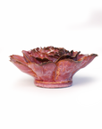 Ceramic flower by Dewberry Camellia Botanicals with layered, ruffled petals in reddish-purple, pink, and dark brown.