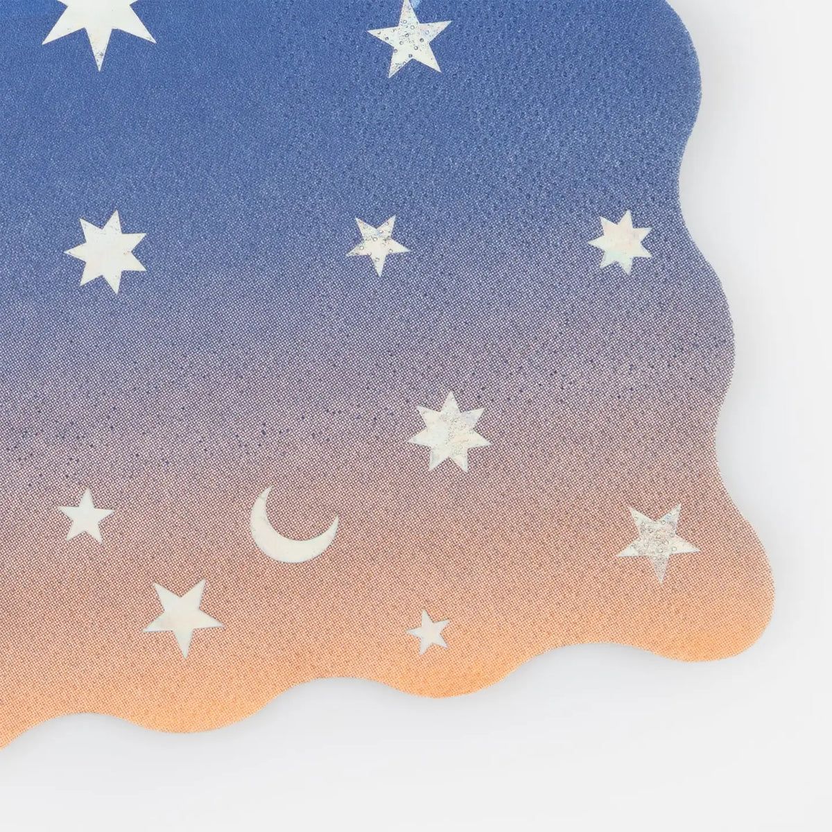 The Faire Making Magic Star Large Napkins feature wavy edges and an ombre gradient from blue to peach, adorned with white stars and a crescent moon—perfect for wizard-themed party decorations.
