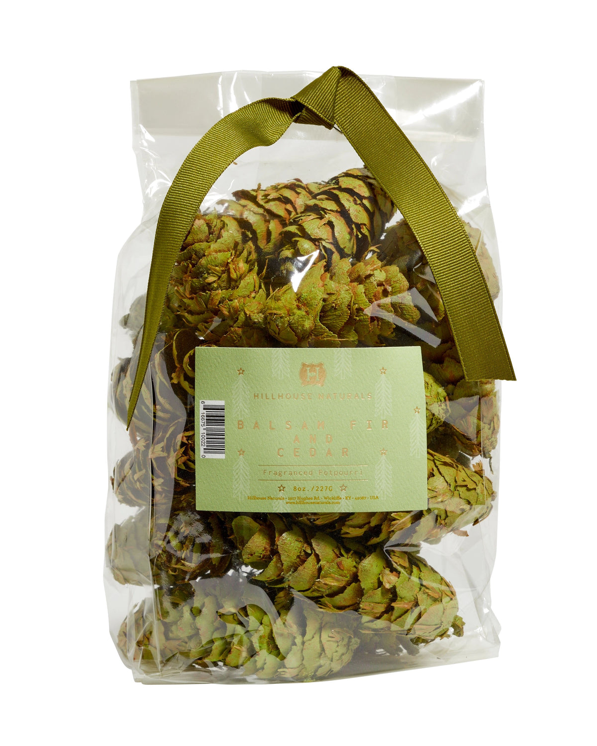 A clear plastic bag of Potpourri Pine Cones by Faire, featuring dried fir cones with cedar and pine notes, finished with an olive-green ribbon at the top.