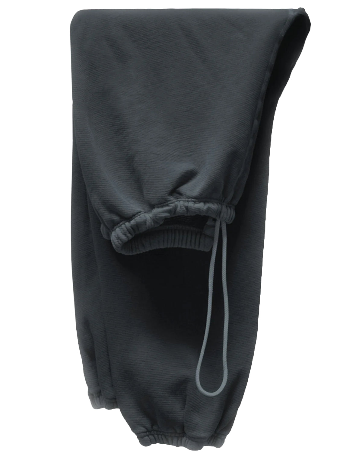 A pair of BASIC GOODNESS OG SWEATPANTS by Free City (sparrow, LLC) in dark gray French terry, featuring elastic cuffs and a visible drawstring, is neatly folded on a white background.