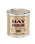 Hay Ride Soy Candle in a tan tin with cedarwood scent by Faire, perfect for fall ambiance.