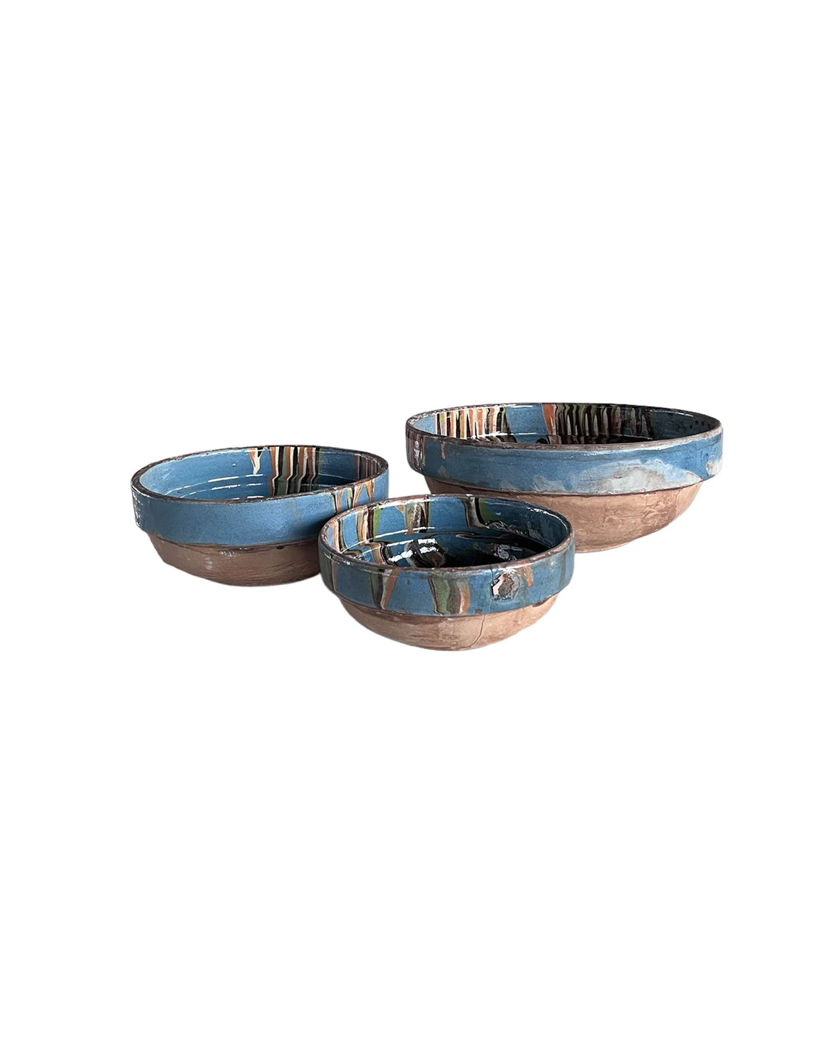 Three Blue Ocean Traders Cottage Crafted Bowls, featuring earthy brown bases and blue-glazed tops, are arranged together on a white background for a charming farmhouse accent.