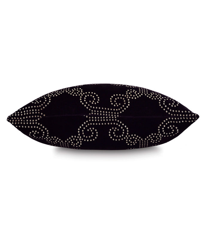 The Elton Onyx Pillow by Eastern Accents is a 22x22 black velvet pillow with a trellis design of swirling metallic studs on woven metallic fabric, shown from the side.