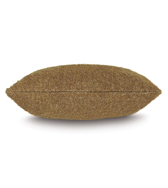 The Marl Mustard Pillow by Eastern Accents, a rectangular textured brown decorative piece, is displayed on a white background from a side view, showcasing its soft and plush design.