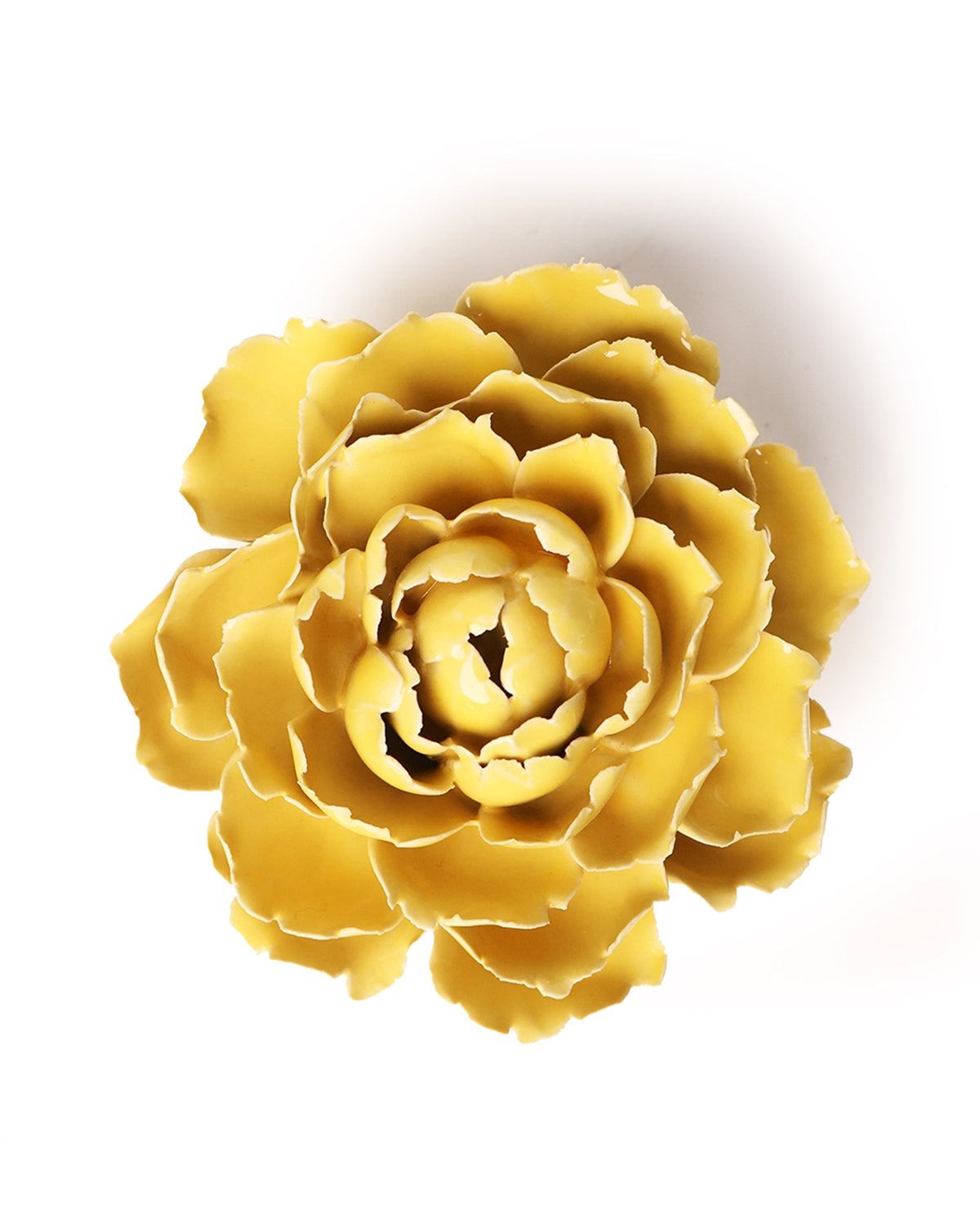 The Buttercup Yellow Peony by Faire is a ceramic flower with layered petals, viewed from above and isolated on white—ideal as botanical wall art or unique handmade home decor.