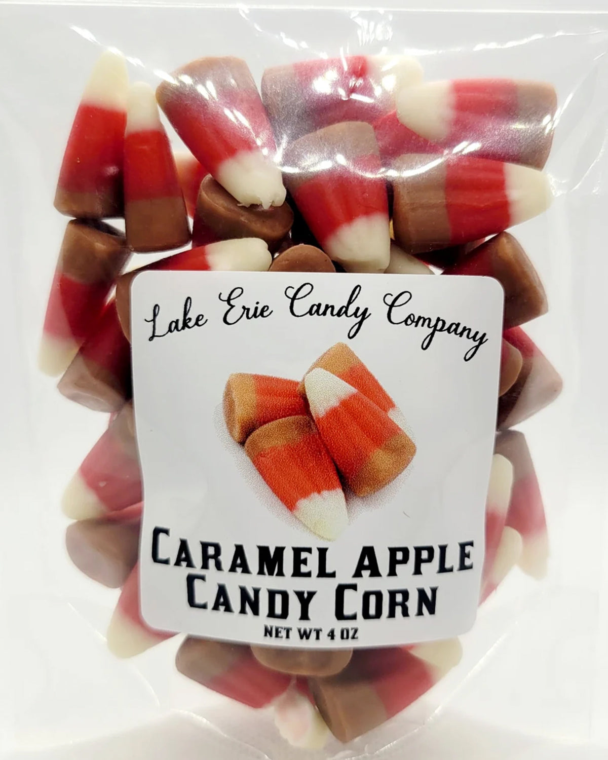 Caramel Apple Candy Corn by Bag of Faire in brown, orange, and white segments.