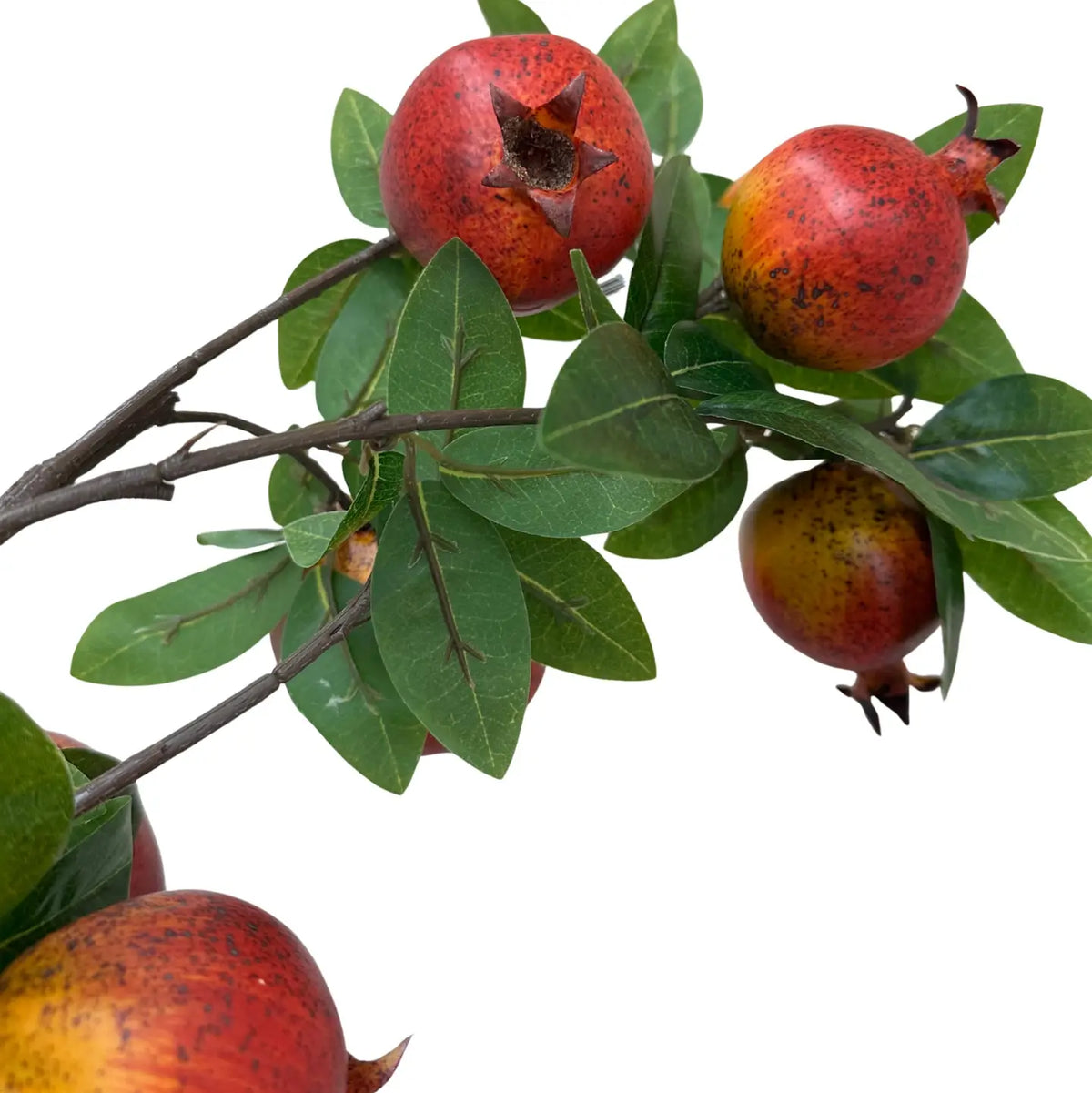 38″ Faux Red Pomegranate Stem with speckled red fruit and green leaves from Bungalow Furniture &amp; Accessories.