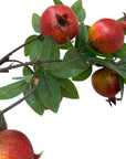 38″ Faux Red Pomegranate Stem with speckled red fruit and green leaves from Bungalow Furniture & Accessories.