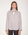 Roseanna Chemises loose-fit vertical striped shirt with an extended, snap-button stand-up collar.