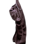 Dark brown satin loose drawcord pants by Free City hanging on a white background.