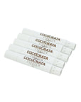 Four white tubes of Faire Cocochata Lip Balm, featuring the product name in brown, are stacked diagonally. Made with organic coconut oil for lasting hydration, the tubes are set against a white background.