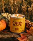 Soy candle with pumpkins, corn, and spice leaves on wood, Faire Corn Maze scent for Bungalow Furniture & Accessories.