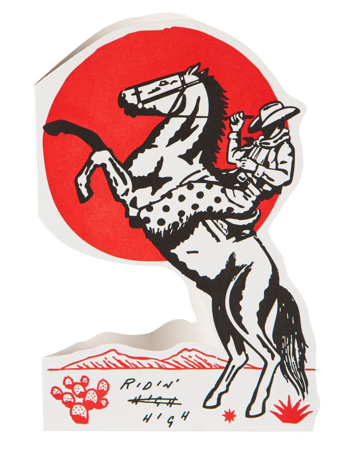 A black-and-white illustration of a cowboy on a rearing horse before a bold red sun, with desert plants below. "RIDIN' HIGH" is at the bottom. The AG Cut Out Greeting Card by Faire makes a unique greeting or standout mantelpiece display.