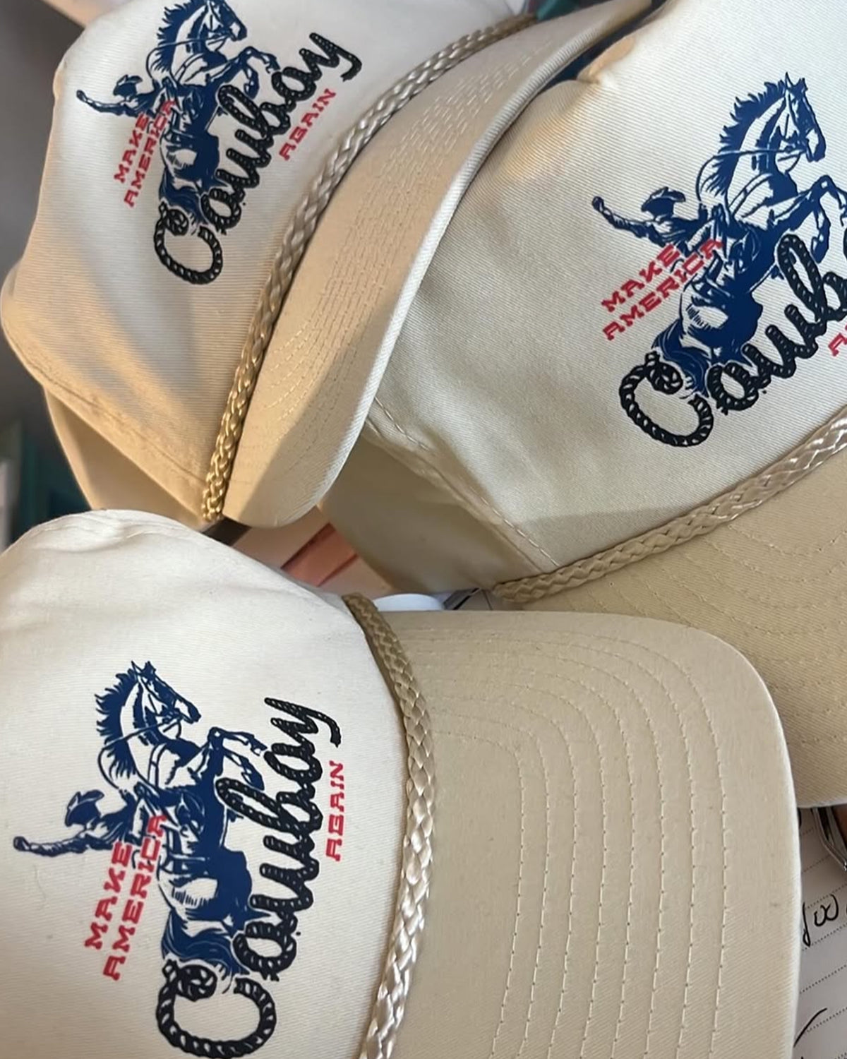 Set of three beige MACA hats with cowboy-inspired embroidery, by Ping Pong Surf Club, perfect for Western style.