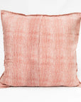 The Blossom Block Print Euro Sham by Faire features a textured pattern of thin, horizontal red and white lines on fabric, artisan crafted for a unique touch, shown against a plain white background.