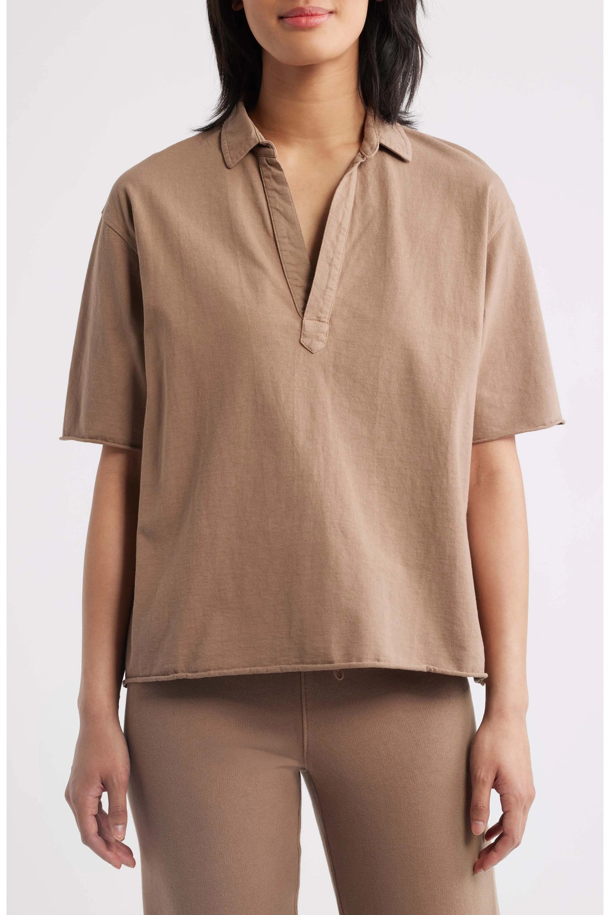 Patty Popover SS Henley by Frank & Eileen in white with tan pants, styled simply against a neutral background.