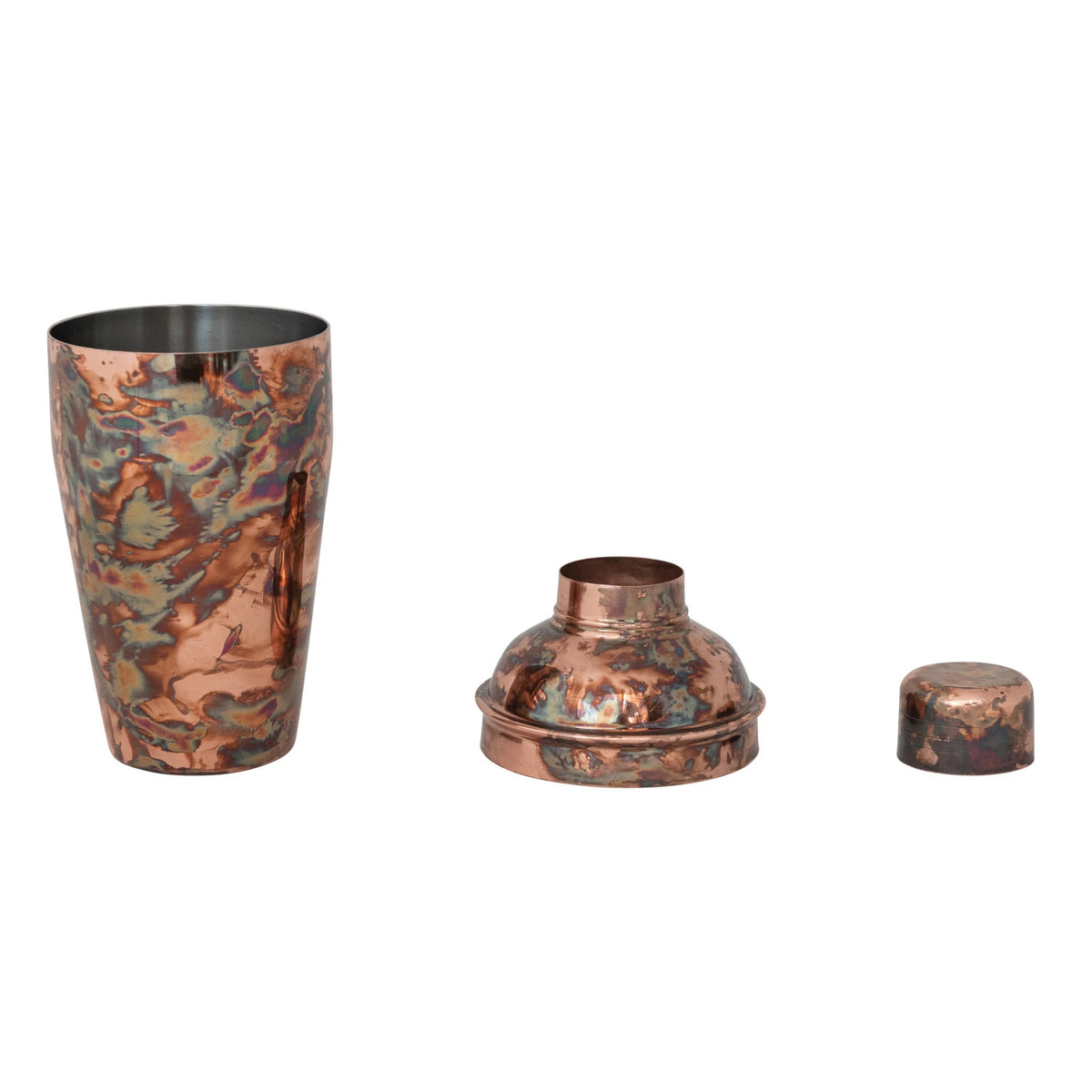 The Creative Co-op Stainless Steel Cocktail Shaker is a three-piece set with an oxidized copper finish, featuring the main cup, strainer top, and small cap arranged in a row on a white background.