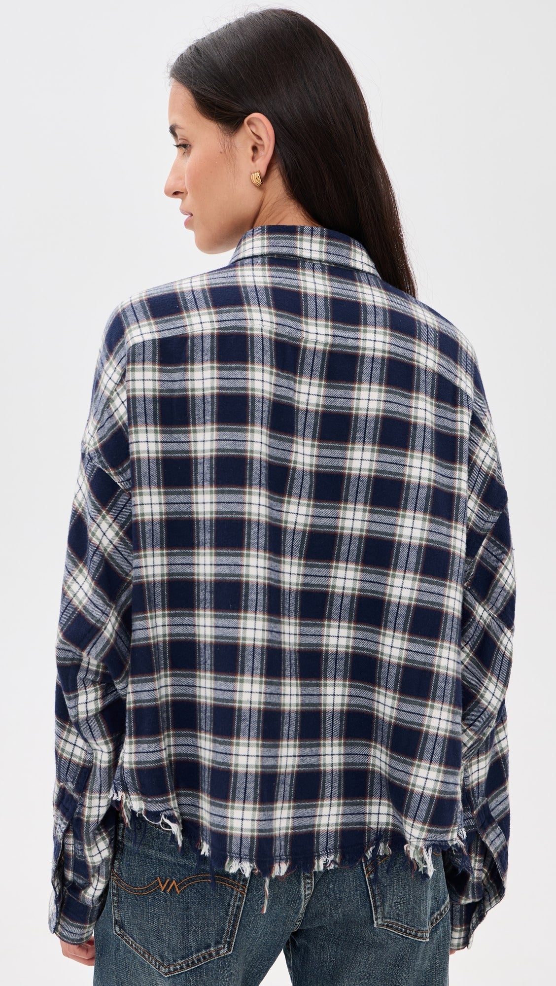 Cropped Denimist work shirt with frayed hem in blue, paired with jeans, shown from the back at Bungalow.