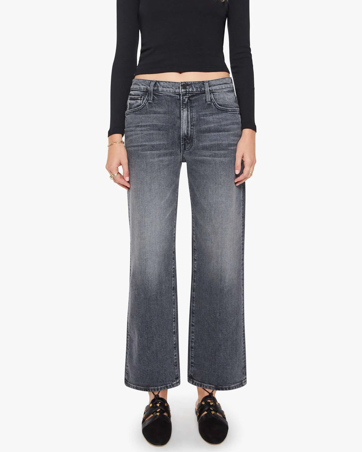 The Dodger Flood high-waisted slouchy jeans by Mother styled with a black crop top and loafers.