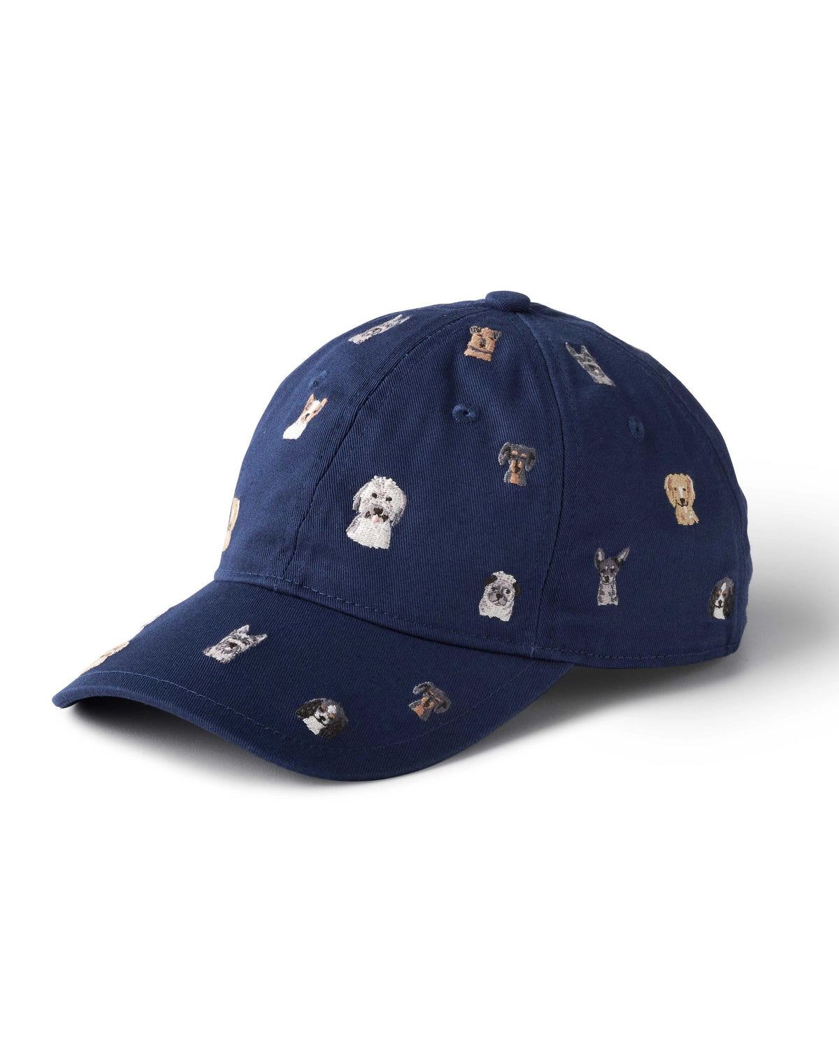 The Faire Dog Days Baseball Cap features playful embroidered dog faces on navy blue fabric and includes an adjustable strap for comfort.
