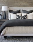 Monterosa Cotton Flannel Duvet Cover by Eastern Accents on a neatly made bed with glowing nightstands in a cozy bedroom.