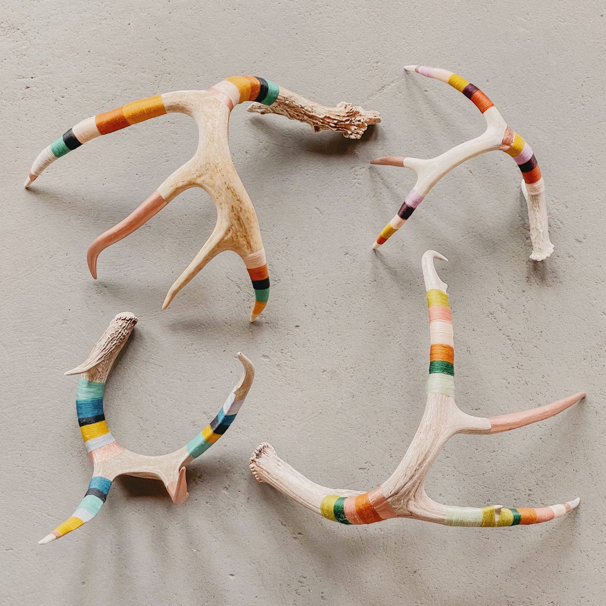 Whitetail Wool Wrapped Deer Antler with Copper from Bungalow Furniture &amp; Accessories featuring colorful thread wraps.
