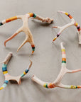 Whitetail Wool Wrapped Deer Antler with Copper from Bungalow Furniture & Accessories featuring colorful thread wraps.