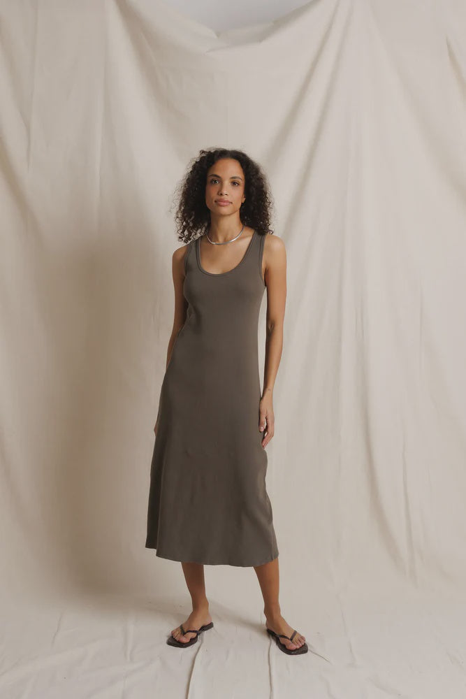 Edith Heavy Rib Midi Tank Dress by Perfectwhitetee in cream, styled casually with flip-flops against fabric backdrop.
