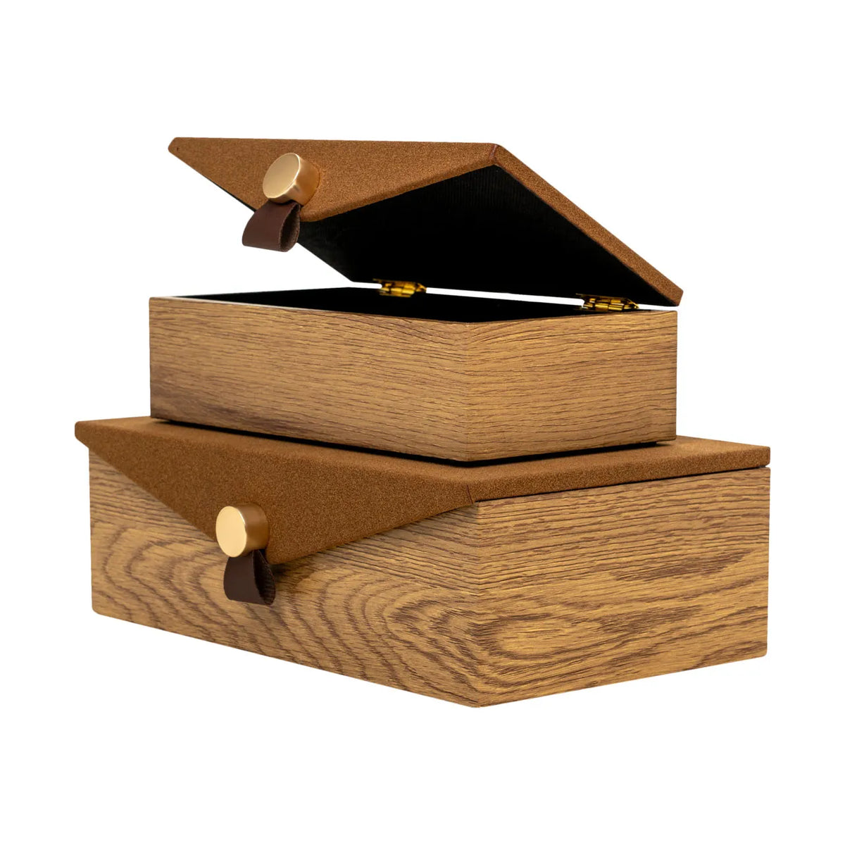 Stacked Harriett Box storage units by Bungalow Furniture & Accessories in wood grain with brown lids and leather pulls.