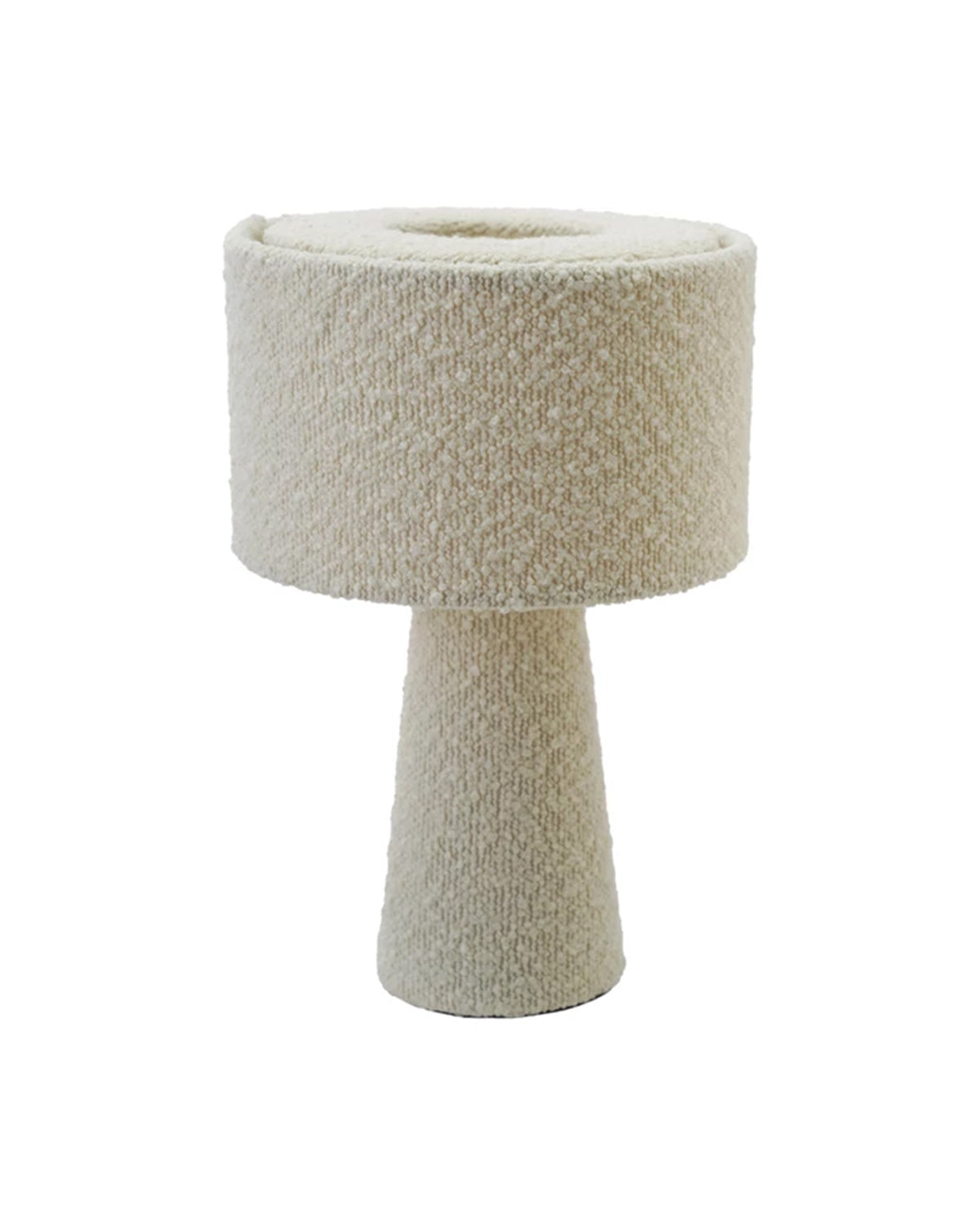 The Bloomingville Bouclé Ivory Fabric Table Lamp features a modern cylindrical base and drum-shaped shade in textured cream bouclé, set against a white background.
