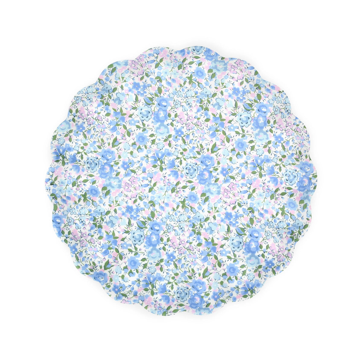 Floral round placemat with blue, purple, and green accents styled with Meri Meri x Liberty plates by Faire.