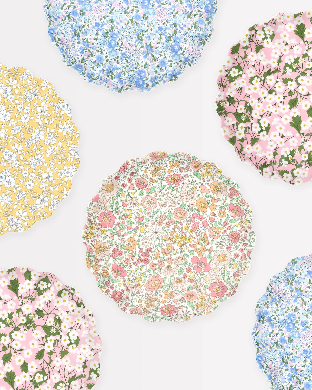 Scalloped-edge plates with colorful floral patterns, set of 6 by Meri Meri x Liberty for Bungalow Furniture & Accessories.