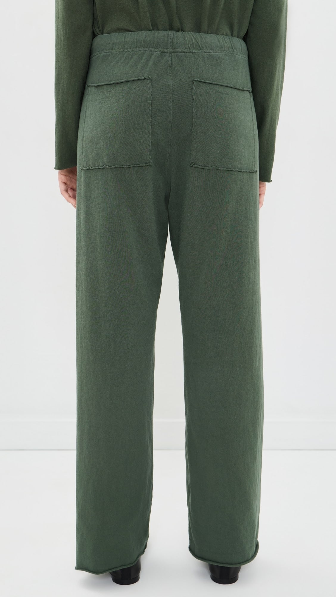 Frank & Eileen dark green cotton patch pocket pants shown from behind, relaxed fit, perfect for casual style.
