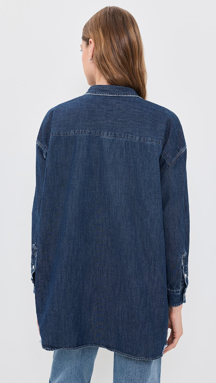 Shirley Oversized button-up shirt in dark wash denim, back view.