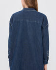Shirley Oversized button-up shirt in dark wash denim, back view.