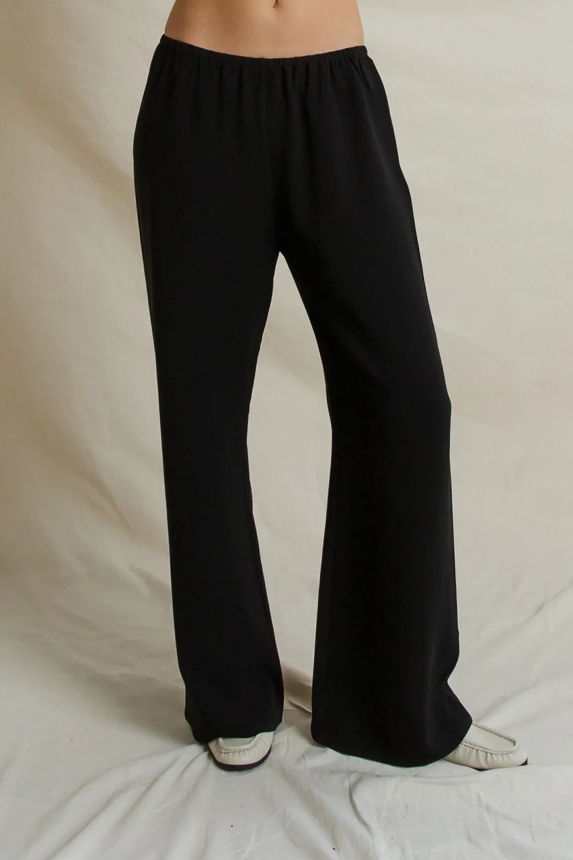 Black wide-leg high-waisted crepe pull-on trousers from the Bungalow Furniture &amp; Accessories Georgia Crepe Pant collection.