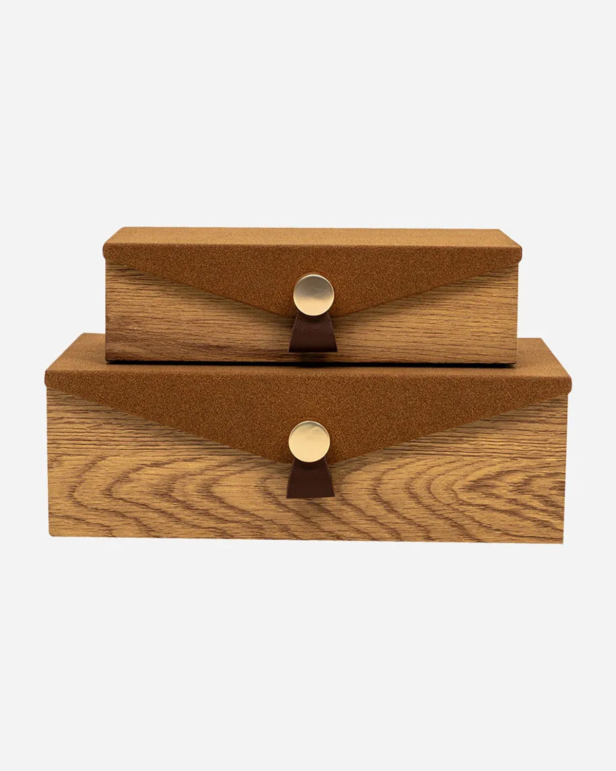 Two stacked Harriett Box wood grain storage boxes with brown suede lids and gold button closures by Bungalow.