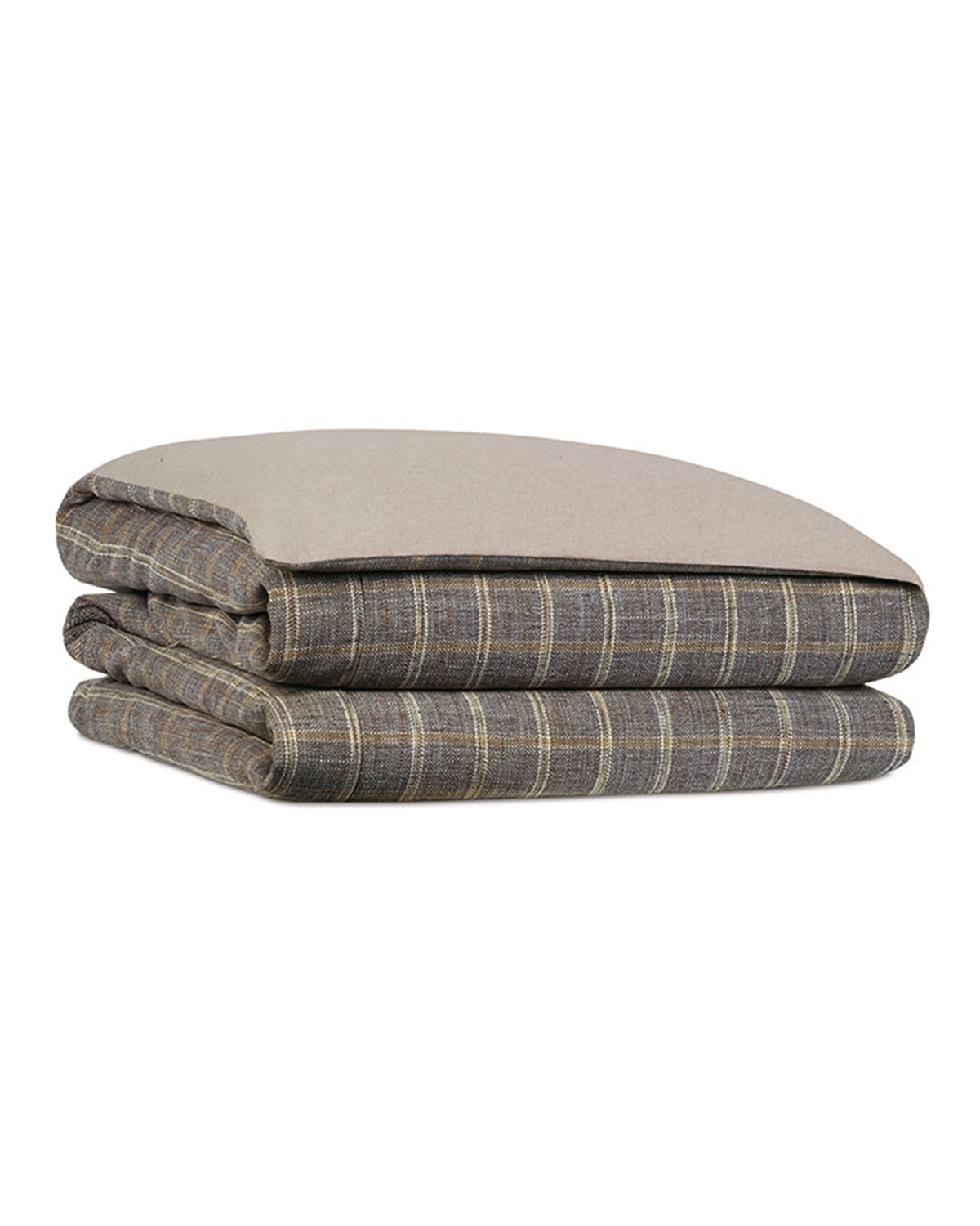 The Eastern Accents Hastings Plaid Comforter features a neatly folded, rectangular design with a grey, beige, and brown plaid pattern, a solid light beige reverse side, and soft poly batting for warmth.