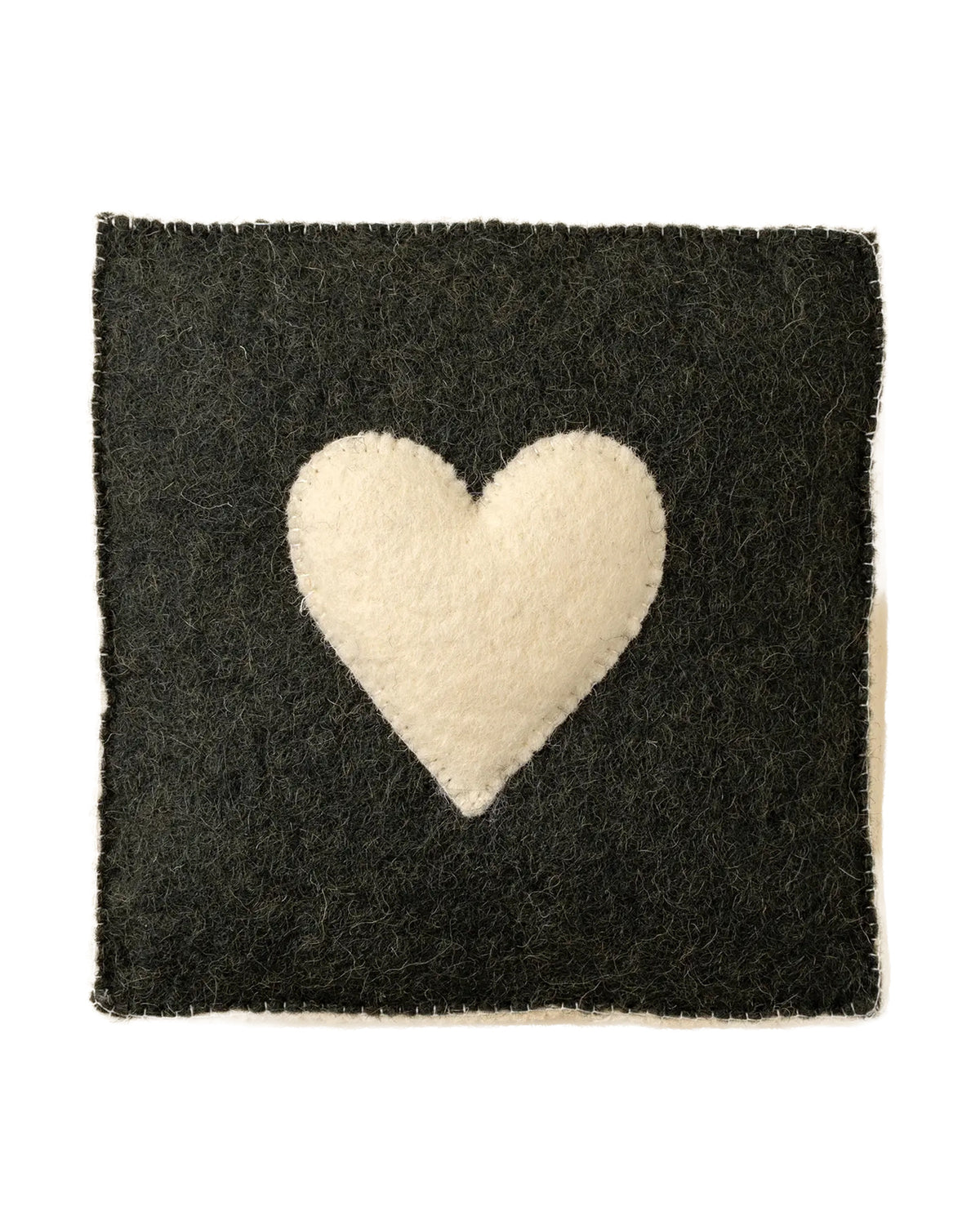 The Indaba Cream Heart Wall Plaque showcases a delicately stitched cream heart on a black felt square, captured against a plain white background.