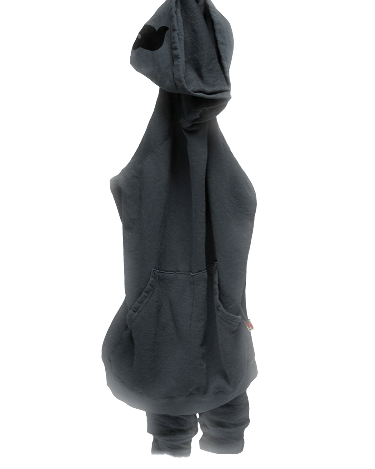 A BASIC GOODNESS HOODIE by Free City (sparrow, LLC), unisex pullover in dark gray, hangs with its hood up and sleeves down. The soft, slightly wrinkled fabric enhances its casual charm. Made in USA.
