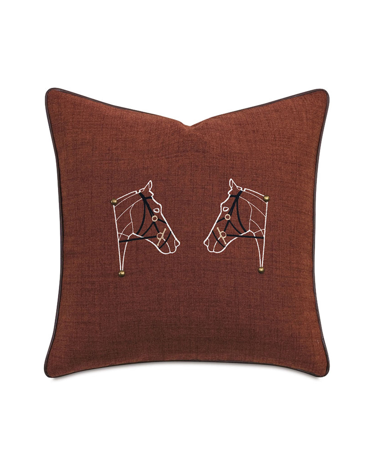 The EQUESTRAIN Pillow by Eastern Accents is a square brown equestrian decorative pillow with two outlined embroidered horse heads facing each other, white stitching, gold accents, and subtle nailhead detail on a plain white background.