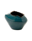 Teal ceramic Ilaria Medium Vase with an asymmetrical, organic rim and dark interior by Bungalow Furniture & Accessories.
